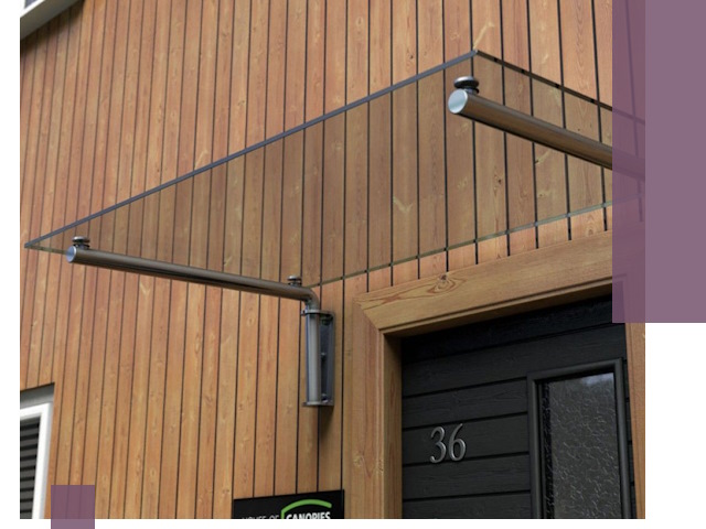 Стеклянные козырьки на входы и фасады в Ханты-Мансийске